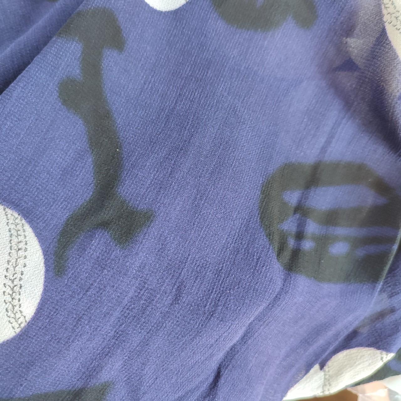 Blusa a maniche ampie