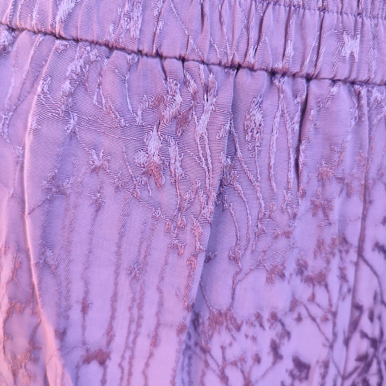 Pantaloncini corti viola